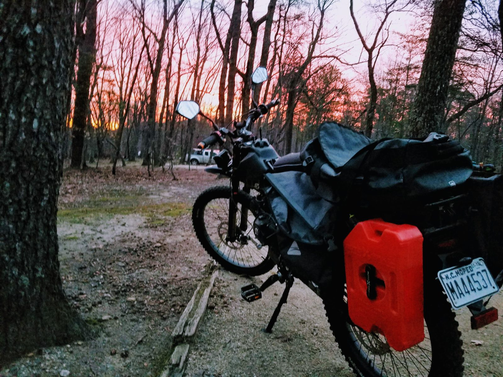 Motorcycle at Sunset with camping gear